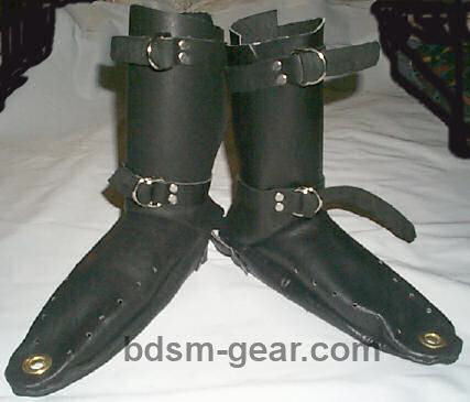 leather bondage boots cuffs spreaders binders and bdsm gear
