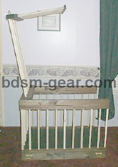 wood and leather dungeon slave cage