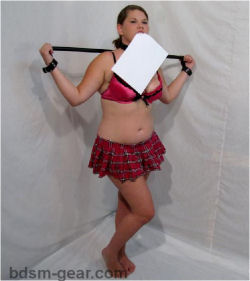 spreader bar with cuffs and collar as seen in the secretary for bdsm fetish gothic gorean submissive and slave bondage