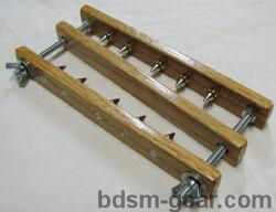 Spiked Wooden CBT Crusher