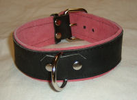 Black leather collar with pink suede lining and front D-ring