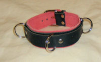 Black leather slave bondage collar with pink suede lining and triple bondage rings