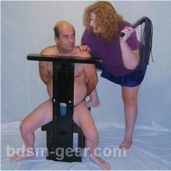 Bondage chair with open access for CBT scenes