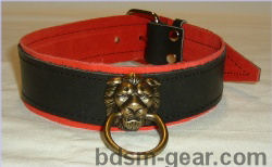 Black leather collar with red suede lining and bronze lion head and ring