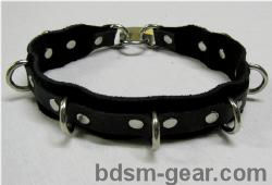 Locking bondage collar with black suede lining and six D-rings