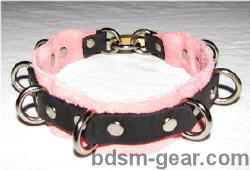 Locking bondage collar with pink suede lining and six D-rings