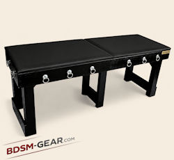 Heavy-duty portable bondage table with leather top and multiple restraint points