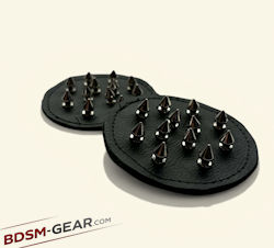 Leather breast torture pads with metal spikes
